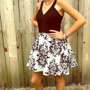 Black velvet print on white open back dress